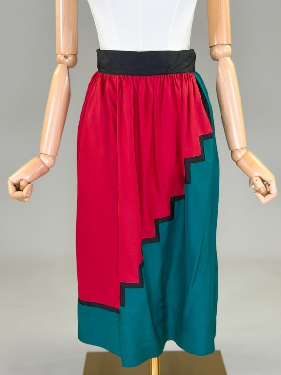 Vintage 1980s Color Block Silk Midi Skirt: Vintage 1980s Color Block Silk Midi Skirt having side hook closure at waist with side pockets. Measuring 27 inch waist, 27.5 inches long. From the lifetime collection, fashion archive and business inv