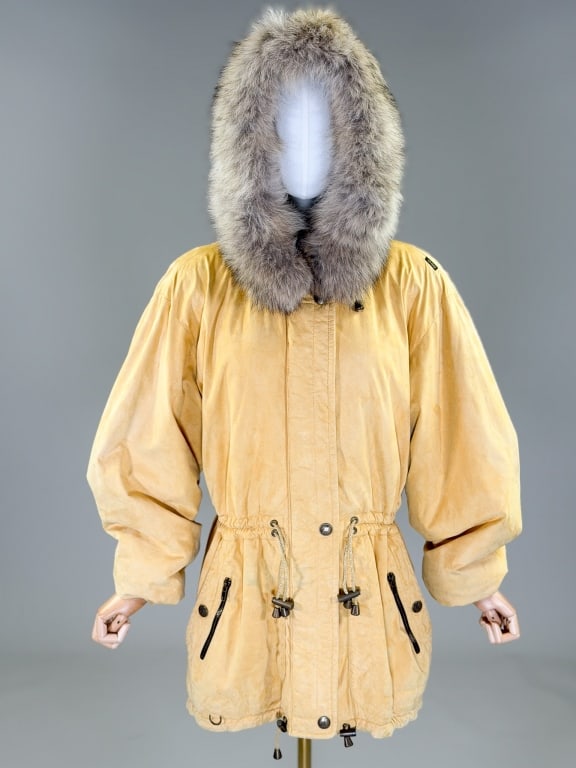Vintage 1980s Suede Leather Fox Fur Trim Ski Coat: Vintage 1980s Suede Leather Fox Fur Trim Ski Coat having hood with fox fur trim, zip front closure, ties to cinch waist and hem, fully lined throughout. Labeled Skea Paris / Vail - marked size 12. Mea