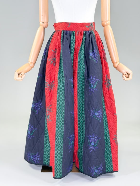 Vintage 1980s Cotton Quilted Patchwork Skirt: Vintage 1980s Cotton Quilted Patchwork Skirt having tie at waist and center back zip closure, fully lined throughout. Labeled Souleiado - marked size 8. Measuring 28 inch waist, 33 inches long. From t