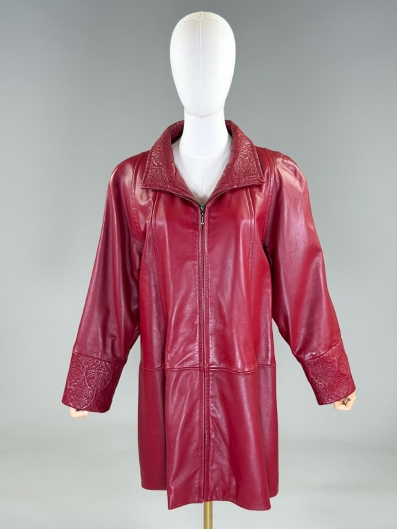 Vintage 1980s Zip Front Leather Embroidered Jacket: Vintage 1980s Zip Front Leather Embroidered Jacket having collar at neck with zip front closure, embroidery through collar and cuffs, and fully lined throughout. Labeled Tiboa Leathers. Measuring 46 i