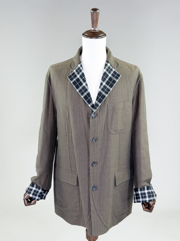 Vintage 1990s Issey Miyake Reversible Blazer: Vintage 1990s Issey Miyake Reversible Blazer Jacket having herringbone wool on one side and wool plaid on one side, both sides having pockets and closing at front with single breasted button front. La