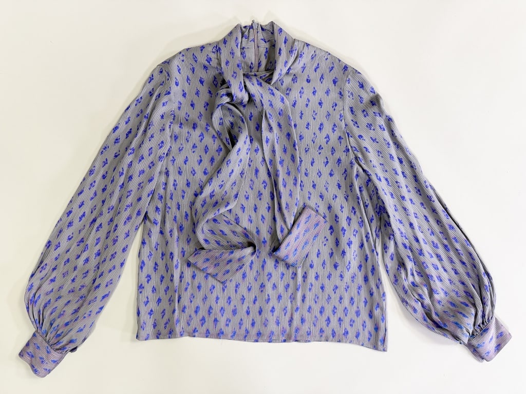 Vintage 1980s Mary Ann Restivo Pussy Bow Blouse: Vintage 1980s Mary Ann Restivo Pussy Bow Blouse having pussy bow tie at neck with back neck zip closure. Labeled Mary Ann Restivo - marked size 4. Measuring 40 inch bust, 22 inches long, 24 inch sleev
