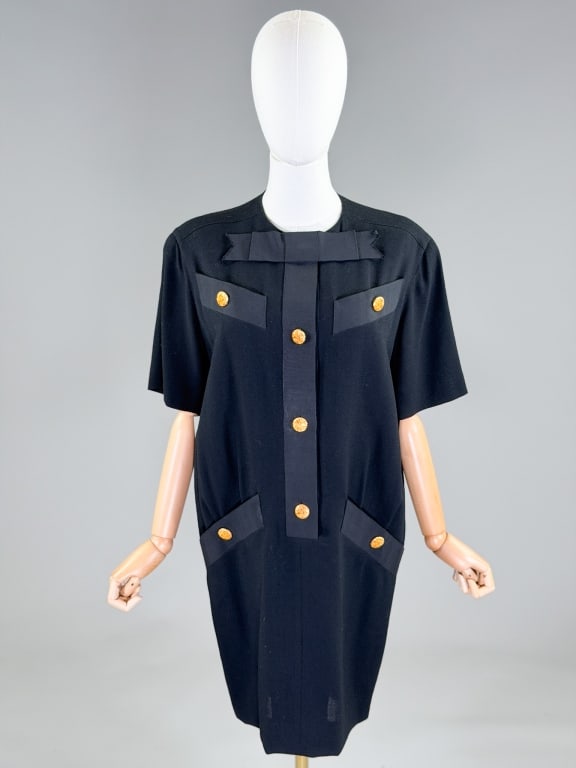Vintage 1980s Richilene Wool Crepe Shift Dress: Vintage 1980s Richilene Wool Crepe Shift Dress having grosgrain ribbon details through front with button front closure. Labeled Richilene New York. Measuring 46 inch bust, 46 inch waist, 36 inches lon