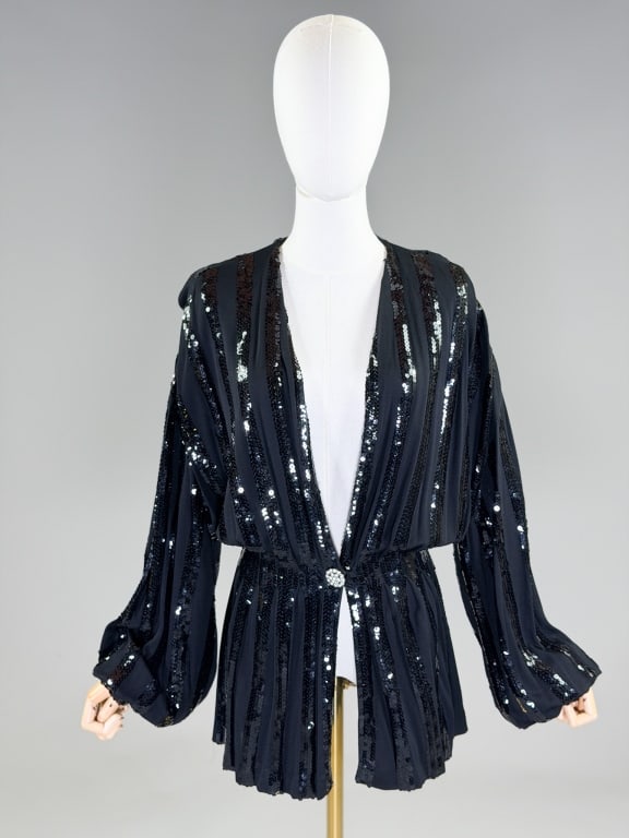 Vintage 1980s Criscione Knit Sequin Jacket Top: Vintage 1980s Criscione Knit Sequin Jacket Top having stripe sequins throughout with snap waist closure. Labeled Criscione, marked size small. Measuring free bust, 26-36 inch waist, 32 inches long, 22