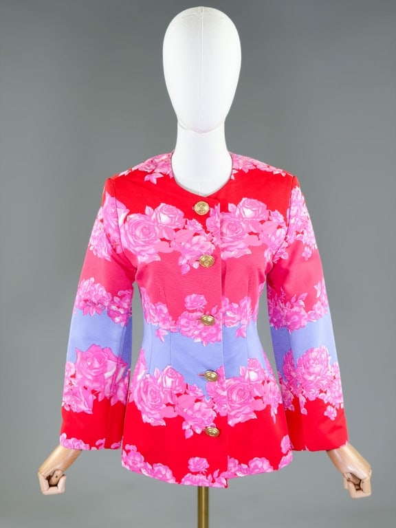 Vintage 1980s Jaeger Floral Print Blazer Jacket: Vintage 1980s Jaeger Floral Print Blazer Jacket having collarless neckline with single breasted button front closure, fully lined. Labeled Jaeger. Measuring 34 inch bust, 28 inch waist, 37 inches long