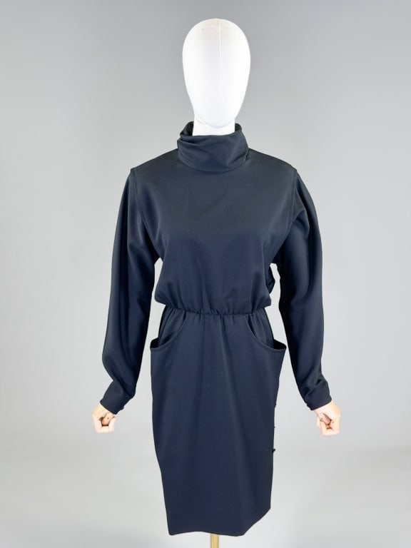 Vintage 1980s Emanuel Ungaro Attributed Wool Dress: Vintage 1980s Emanuel Ungaro Attributed Wool Dress having turtleneck, back zip closure, and two front pockets. Measuring 40 inch bust, 26 inch waist, 40 inches long, 24 inch sleeve length. From the li