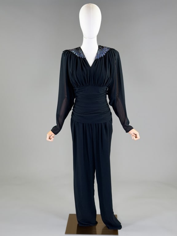 Vintage 1980s Casadei Beaded Poly Chiffon Jumpsuit: Vintage 1980s Casadei Beaded Poly Chiffon Jumpsuit having beaded details at shoulders with draped ruching throughout, closing at back with zip and tie at neck. Labeled Casadei - dated 1982. Measuring 