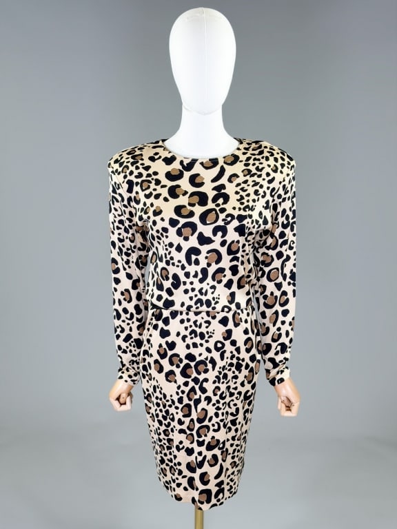 Vintage 1980s Flora Kung Leopard Print Knit Dress: Vintage 1980s Flora Kung Leopard Print Knit Dress having rounded neckline with ribbed waistband and button closure at back neck. Labeled Flora Kung, marked size 6. Measuring 34-44 inch bust, 24-38 inc