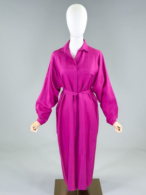 Vintage 1980s Jerry Regenbogen Silk Dress: Vintage 1980s Jerry Regenbogen Silk Dress having covered placket button front closure with breast pocket and two side pockets. Labeled Jerry Regenbogen, marked size 8. Measuring 42 inch bust, 42 inch 