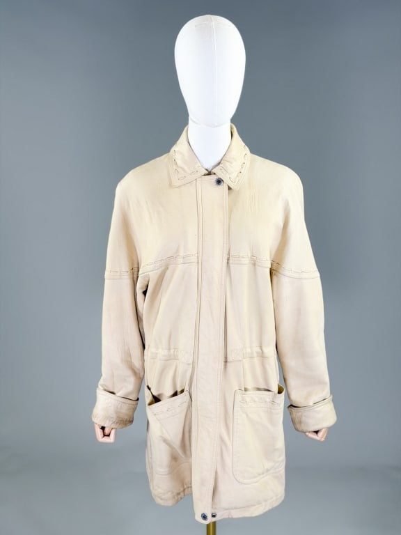 Vintage 1980s Leather Zip Front Anorak Jacket: Vintage 1980s Leather Zip Front Anorak Jacket having zip front closure with stitch details throughout, adjustable waist and two front pockets, fully lined. Labeled LNR, marked size XS. Measuring 44 in