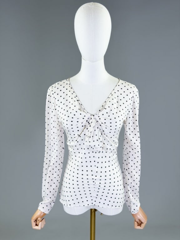 Vintage 1980s Emanuel Ungaro Silk Blouse Top: Vintage 1980s Emanuel Ungaro Silk Blouse Top having ruched bust with draped detail at front, closing at side with zip. Labeled Ungaro Ter. Measuring 38 inch bust, 26-34 inch waist, 23 inches long, 23 