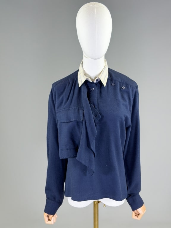 Vintage 1980s Byblos Wool Draped Blouse Top: Vintage 1980s Byblos Wool Draped Blouse Top having quarter placket button front closure with draped detail and front pocket. Labeled Byblos, marked size US Small. Measuring 38 inch bust, 24 inches lon
