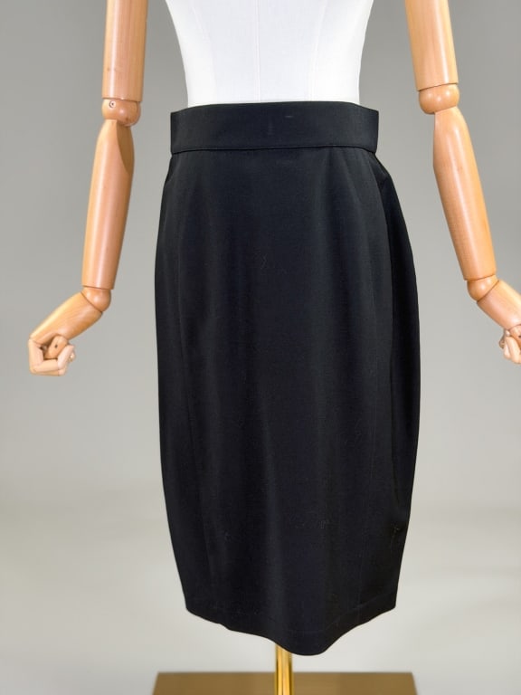 Vintage 1990s Thierry Mugler Wool Pencil Skirt: Vintage 1990s Thierry Mugler Wool Pencil Skirt having center back zip closure, fully lined throughout. Labeled Thierry Mugler - marked size 42. Measuring 29 inch waist, 26 inches long. From the