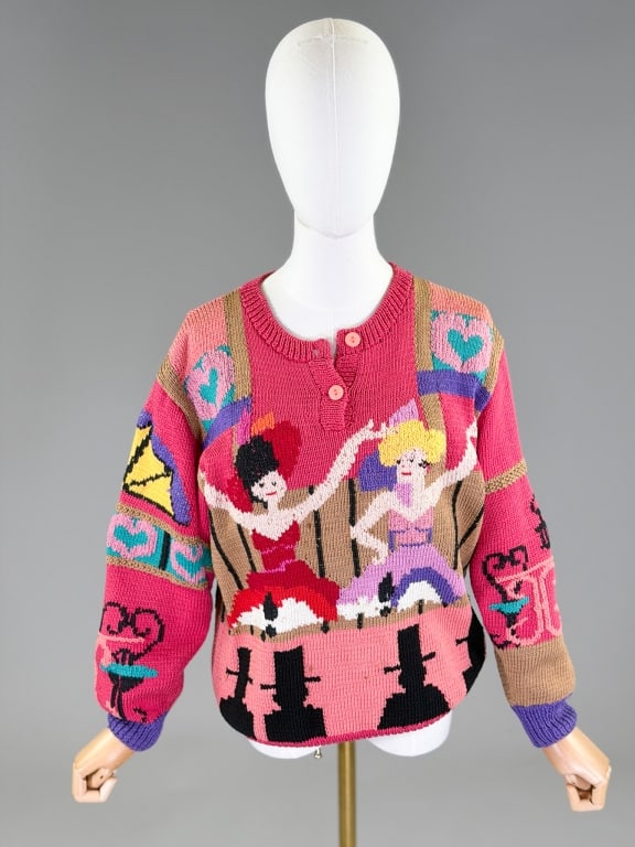 Vintage 1990s Berek Figural Knit Sweater Top: Vintage 1990s Berek Figural Knit Sweater Top having figural knit graphic at front with quarter button closure at neck. Labeled Berek. Measuring 40 - 46 inch bust, 24 inches long, 21 inch sleeve