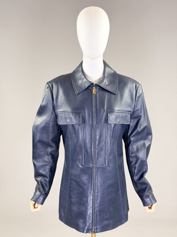 Vintage 1990s Laurel Escada Leather Zip Up Jacket: Vintage 1990s Laurel Escada Leather Zip Up Jacket having collar at neck with zip front closure and two front breast pockets, fully lined. Labeled Laurel, marked size 42. Measuring 42 inch bust, 38 inc