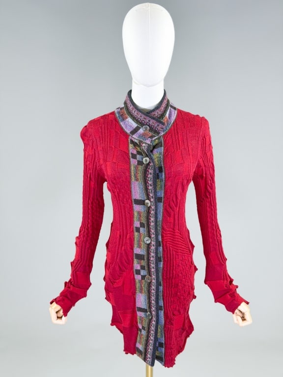 Vintage 1990s Abstract Knit Sweater Dress: Vintage 1990s Abstract Knit Sweater Dress having button front closure with abstract knit design throughout. Labeled M. & Kyoko, marked size 1. Measuring 32-42 inch bust, 24-44 inch waist, 31 inches lo