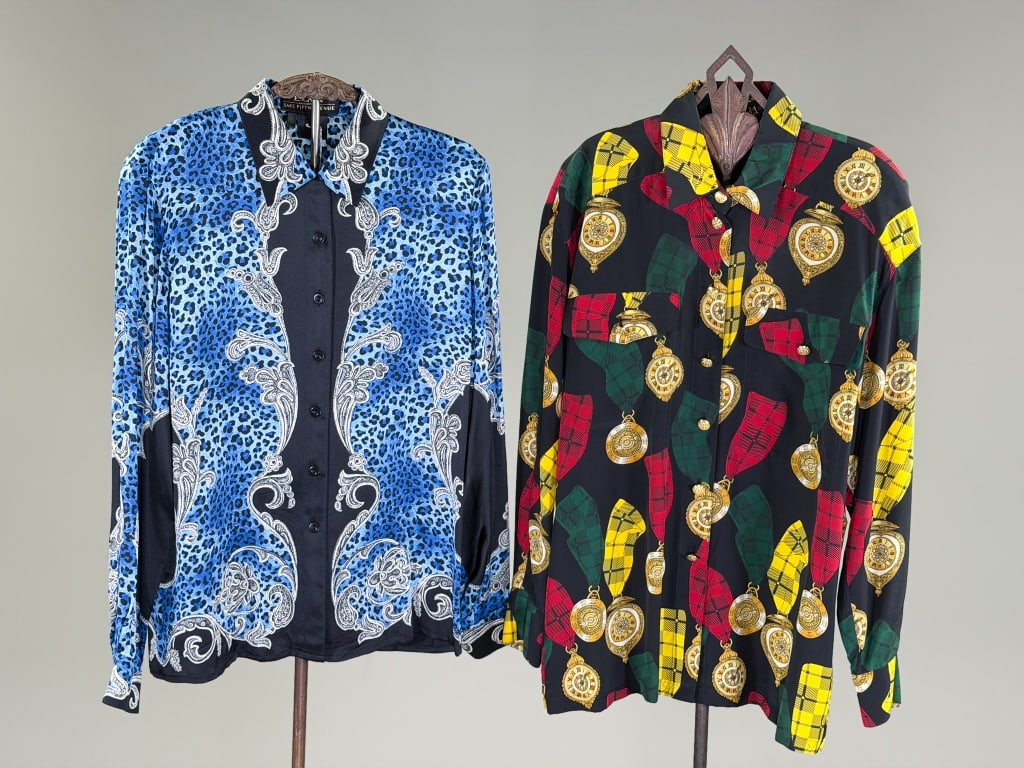Two Vintage 1990s Escada Silk Printed Blouses Tops: Two Vintage 1990s Escada Silk Printed Blouses Tops. One labeled Escada by Margaretha Ley. Measuring 44 inch bust, 28 inches long, 22 inch sleeve length. One Labeled Escada Exclusive for Saks Fifth Ave