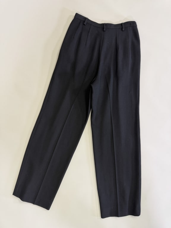 Vintage 2000s Emanuel Ungaro Wool Trousers Pants: Vintage 2000s Emanuel Ungaro Wool Trousers Pants having zip front closure with pockets at sides. Labeled Emanuel Ungaro Paris collection - marked size 40. Measuring 26 inch waist, 12 inch rise, 28 inc