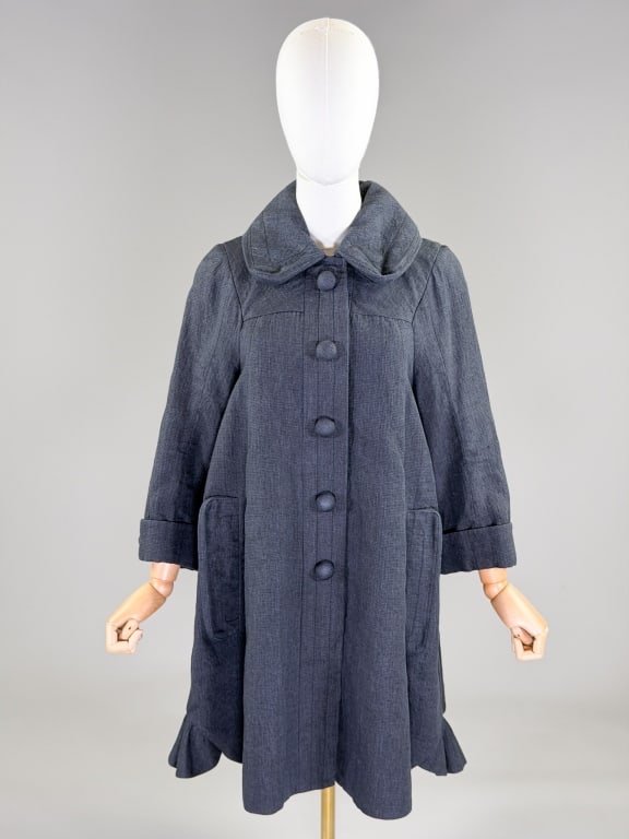 Vintage 2000s Marc Jacobs Mod A-Line Dress Coat: Vintage 2000s Marc Jacobs Mod A-Line Dress Coat having Peter Pan collar with snap front closure and two front pockets labeled Marc Jacobs. Marked size 4. Measuring 42 inch bust, free waist, 35 inches