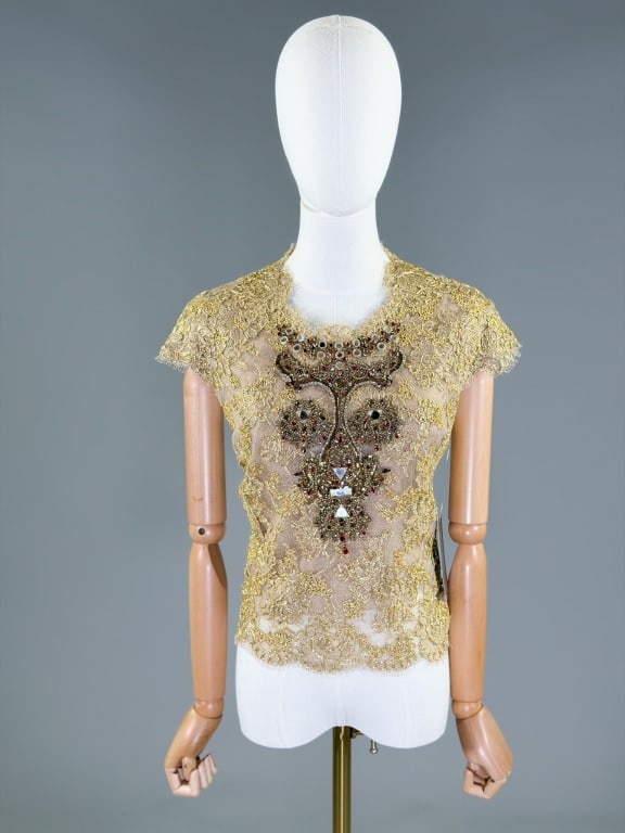 Vintage 2000s Reem Acra Metallic Lace Blouse Top: Vintage 2000s Reem Acra Metallic Lace Blouse Top having embellishments at center front with back neck closure. Labeled Reem Acra New York, marked size 8. Measuring 38 inch bust, 21 inches long, 3