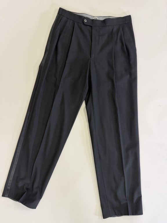 Vintage Wool Zip Front Tuxedo Trousers Pants: Vintage Wool Zip Front Tuxedo Trousers Pants having zip front closure with front and back pockets. Measuring 32 inch waist, 13 inch rise, 31 inch inseam. From the lifetime collection, fashion archive