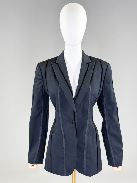 Vintage Richard Tyler Couture Wool Blazer Jacket: Vintage Richard Tyler Couture Wool Blazer Jacket having notched lapel collar with single breasted button front closure and two front pockets. Labeled Richard Tyler Couture, marked size 8. Measuring 38