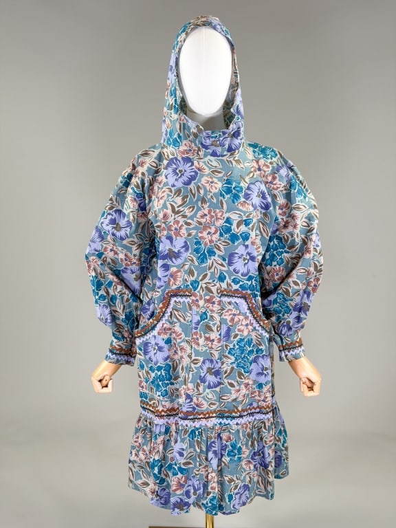 Vintage Handmade Hooded Ric-Rac Dress: Vintage Handmade Hooded Ric-Rac Dress having hood at neck with mock turtleneck, two front patch pockets and ric-rac details throughout. Measuring 48 inch bust, 46 inch waist, 38 inches long, 24 inch s