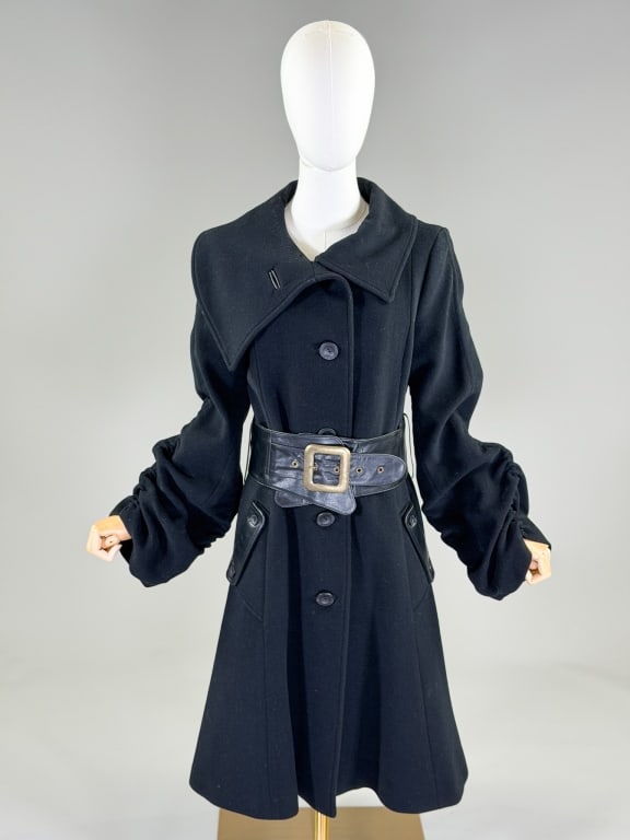 Mackage Wool Belted Leather Trim Swing Coat: Mackage Wool Belted Leather Trim Swing Coat having button front closure, two front pockets and ruched sleeves. Labeled Mackage, marked size Medium. Measuring 38 inch bust, 36 inch waist, 41 inches