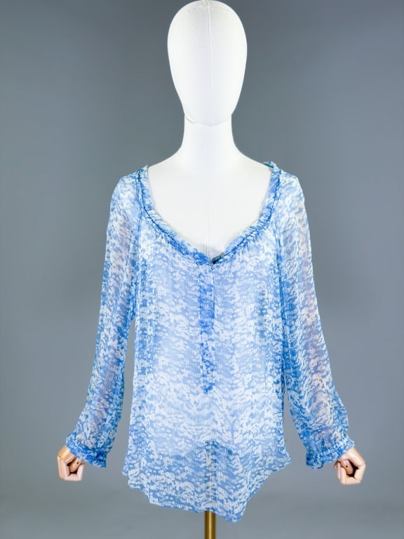 Isabel Marant Etoile Silk Chiffon Printed Blouse: Isabel Marant Etoile Silk Chiffon Printed Blouse having quarter placket button front closure. Labeled Isabel Marant Etoil, marked size 38. Measuring 42 inch bust, 27 inches long, 22 inch sleeve