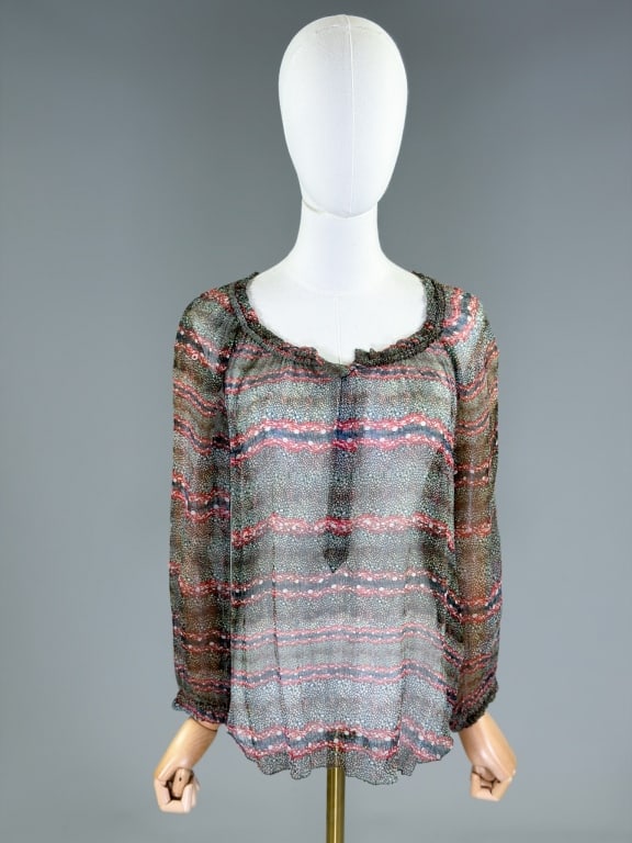 Isabel Marant Etoile Silk Chiffon Printed Blouse: Isabel Marant Etoile Silk Chiffon Printed Blouse having quarter placket button front closure. Labeled Isabel Marant Etoil, marked size 38. Measuring 42 inch bust, 27 inches long, 22 inch sleeve