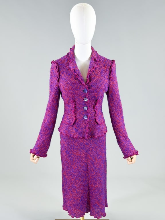 Vintage 2000s Moschino Tweed Wool Skirt Suit Set: Vintage 2000s Moschino Tweed Wool Skirt Suit Set with jacket having button front closure. Marked size US 8 Measuring 36 inch bust, 30 inch waist, 21 inches long, 25 inch sleeve length. Skirt having