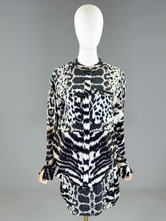 Vintage 2000s Roberto Cavalli Animal Print Dress: Vintage 2000s Roberto Cavalli Animal Print Dress having button front closures with two front pockets and draped skirt. Measuring 40 inch bust, 40 inch waist, 43 inches long, 24 inch sleeve length. Fro