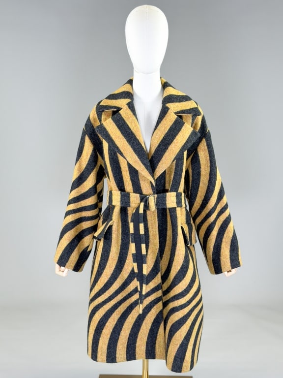 Dries Van Noten Wool Psychedelic Stripe Coat: Dries Van Noten Wool Psychedelic Stripe Coat having open front with belt at waist and two front pockets. Marked size small. Measuring 40 inches long, 20 inch sleeve length. From the lifetime