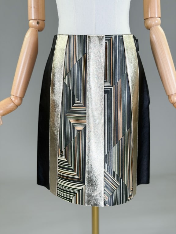 Longchamp Printed Leather Metallic Patchwork Skirt: Longchamp Printed Leather Metallic Patchwork Skirt having side zip closure. Measuring 28 inch waist, 18 inches long. From the lifetime collection, fashion archive and business inventory of collector a