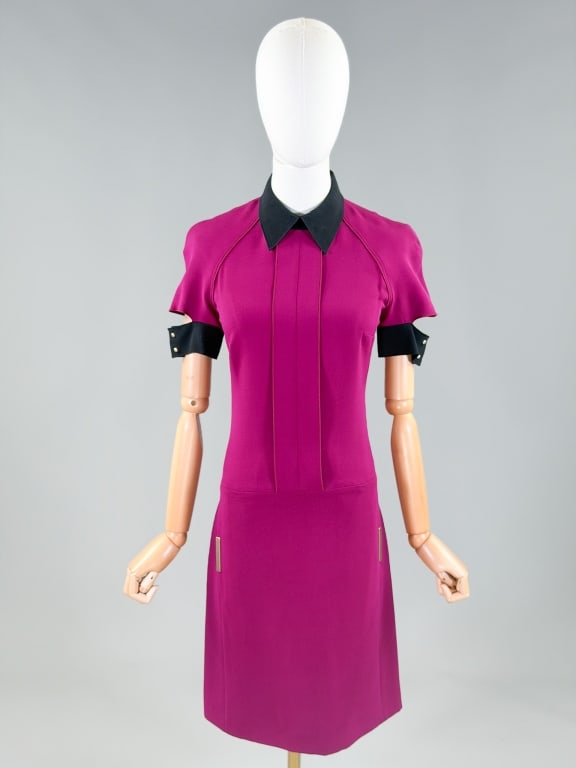 Vintage Victoria Beckham Silk Wool Shirt Dress: Vintage Victoria Beckham Silk Wool Shirt Dress having back zip closure with two front pockets. Marked size US 2. Measuring 32-34 inch bust, 28 inch waist, 38 inches long, 9 inch sleeve long. From the 