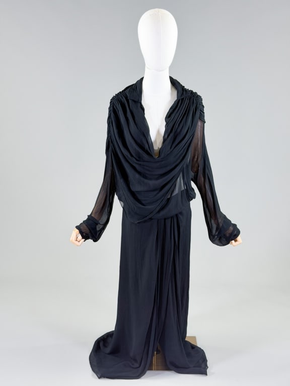 Vintage Nicholas K. Draped Sheer Gown Dress: Vintage Nicholas K. Draped Sheer Gown Dress having back zip closure and draped details throughout. Marked size Medium. Measuring 36-44 inch bust, 24-34 inch waist, 58 inches long, 30 inch sleeve