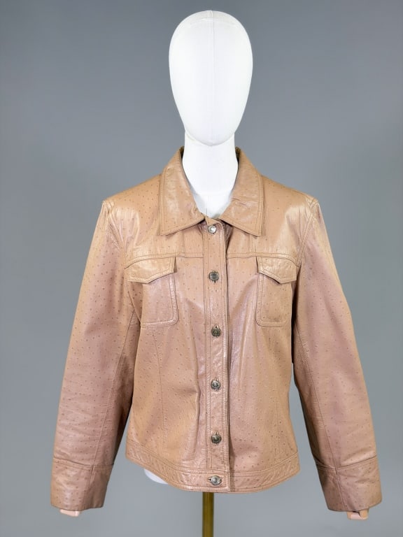Vintage Vakko Ostrich Print Leather Jacket Coat: Vintage Vakko Ostrich Print Leather Jacket Coat. Marked size Large with button front closure. Measuring 40 inch bust, 24 inches long, 24 inch sleeve length. From the lifetime collection, fashion