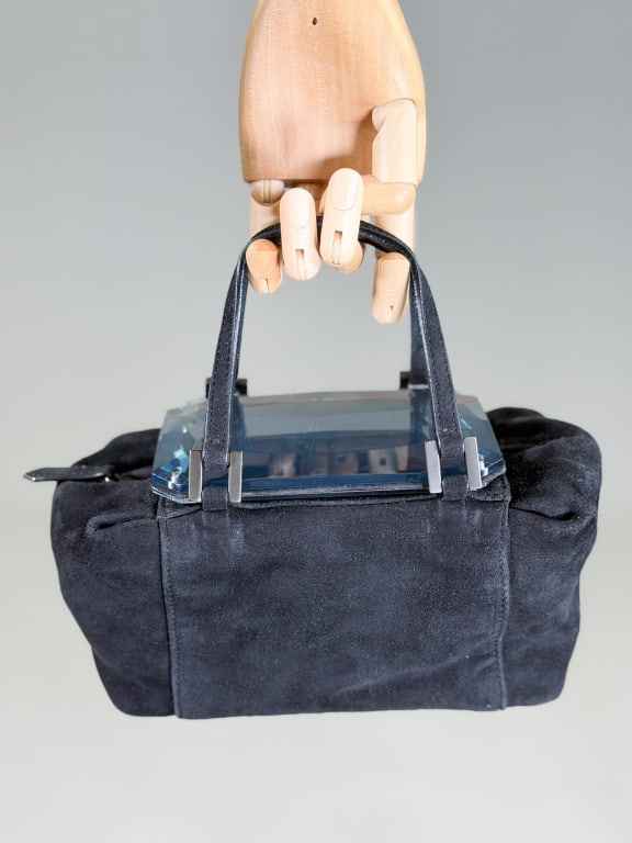 Vintage Fendi Suede Leather Vanity Bag: Vintage Fendi Suede Leather Vanity Bag having zip top closure with mirrored vanity panel at top. Measuring approximately 5 inches high by 10 inches wide by 5 inches deep. From the lifetime collection,
