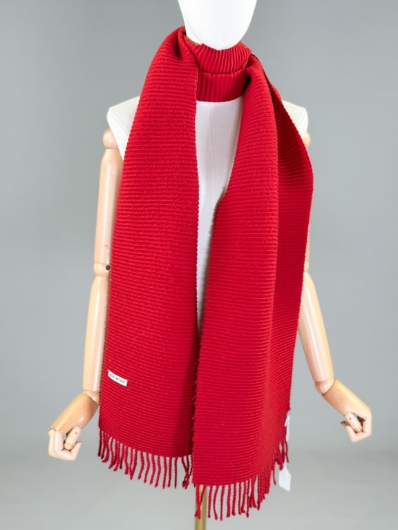 Vintage Issey Miyake Knit Pleated Neck Scarf: Vintage Issey Miyake Knit Pleated Neck Scarf having fringe at edges and pleated throughout. Measuring approximately 80 inches long by 12 inches wide. From the lifetime collection, fashion archive and 