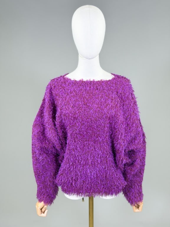 Vintage Issey Miyake Pleats Please Sweater Top: Vintage Issey Miyake Pleats Please Sweater Top having knit body with pleated lining. Marked size 4. Measuring one size fits most, 24 inches long, 20 inch sleeve length. From the lifetime collection, f