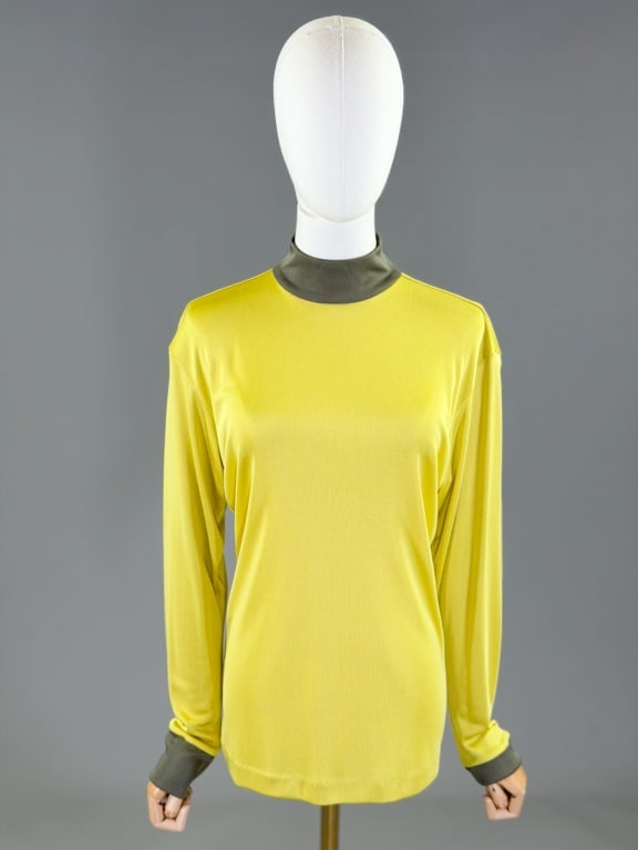 Vintage 1980s Issey Miyake Knit Color Block Top: Vintage 1980s Issey Miyake Knit Color Block Top having turtleneck with back neck zip closure and stretch throughout. Labeled Issey Miyake. Marked size M. Measuring 40-50 inch bust, 26 inches long, 24 