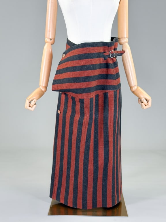 Vintage 1980s Issey Miyake Woven Stripe Skirt: Vintage 1980s Issey Miyake Woven Stripe Skirt having button and buckle closures at waist. Marked size 10. Measuring 28-30 inch waist, 32 inches long. From the lifetime collection, fashion archive and 