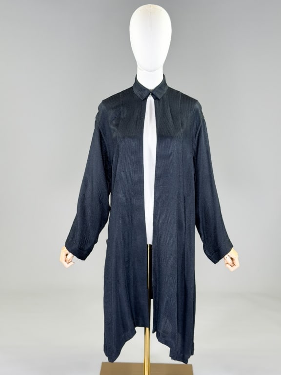 Vintage 1990s Yohji Yamamoto Knit Cardigan Sweater: Vintage 1990s Yohji Yamamoto Knit Cardigan Sweater having open front with hook at neck and side pockets. Marked size M. Measuring one size fits most, 41 inches long, 20 inch sleeve length. From the li