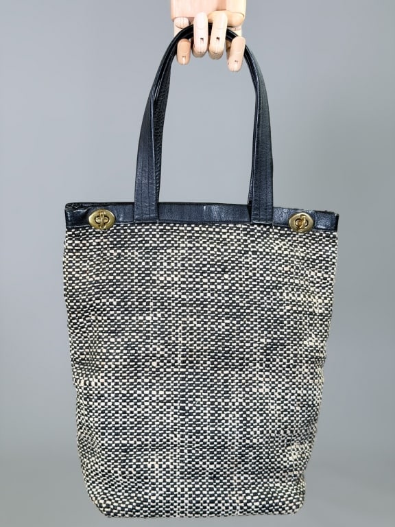 Vintage 1960s Bonnie Cashin Leather Tote Bag Purse: Vintage 1960s Bonnie Cashin Leather Woven Tote Bag Purse having metal toggle closure. From the estate of Phillip Sils. Measuring approximately 13 inches high by 10 inches wide by 5 inches deep. From t