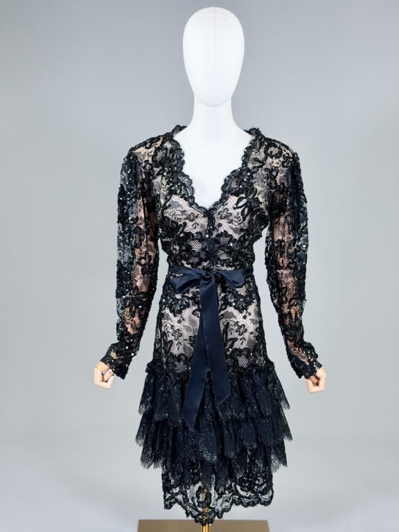 Vintage 1980s Emanuel Ungaro Lace Sequin Dress: Vintage 1980s Emanuel Ungaro Lace Sequin Dress closing at front with snaps and hooks. Marked size 38. Measuring 36-40 inch bust, 26 inch waist, 44 inches long, 24 inch sleeve length. From the lifetime