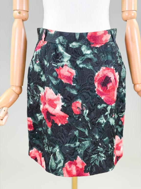 Vintage Dolce & Gabbana Floral Silk Skirt: Vintage Dolce & Gabbana Floral Silk Skirt having back zip closure with belt loops at waist. Marked size 44. Measuring 30 inch waist, 17 inches long. From the lifetime collection, fashion archive and b