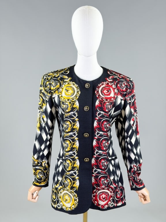 Vintage 1990s Escada Printed Blazer Jacket: Vintage 1990s Escada Printed Blazer Jacket having button front closure and two front pockets. Marked size 38. Measuring 40 inch bust, 36 inch waist, 29 inches long, 23 inch sleeve length. From the lif