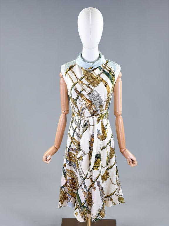 Vintage 1960s Hermes Paris Silk Printed Day Dress: Vintage 1960s Hermes Paris Silk Printed Day Dress having button closure at shoulder. Measuring 34-42 inch bust, 28-40 inch waist, 40 inches long. General wear as shown throughout. From the lifetime co