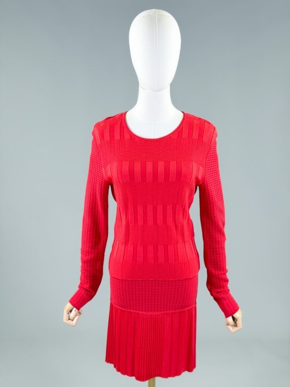 Vintage 1990s Christian Lacroix Knit Skirt Set: Vintage 1990s Christian Lacroix Knit Skirt Set with top having back neck zip closure and stretch throughout. Measuring 32-42 inch bust, 22 inches long, 25 inch sleeve length. Skirt with elastic waist 