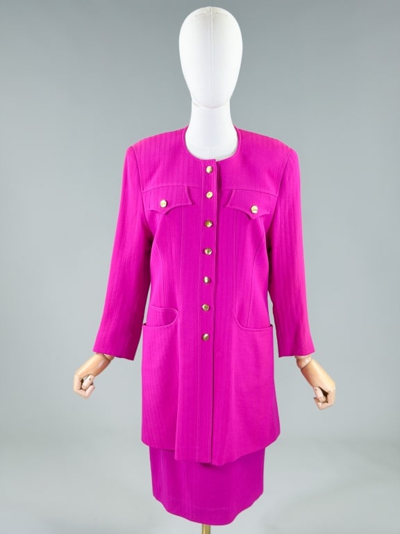 Vintage 1990s Christian Lacroix Skirt Suit Set: Vintage 1990s Christian Lacroix Skirt Suit Set with jacket having button front closure and front pockets. Measuring 36 inch bust, 36 inch waist, 33 inches long, 20 inch sleeve length. Skirt closing wi
